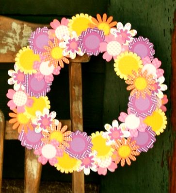 Make this easy DIY wreath to add festive style to your front door or porch. By following the simple step-by-step tutorial, you'll have a beautiful wreath in a few hours! #craftedliving #diycrafts #wreaths #springdecor
