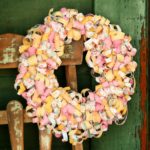 Make this easy DIY wreath to add festive style to your front door or porch. By following the simple step-by-step tutorial, you'll have a beautiful wreath in a few hours! #craftedliving #diycrafts #wreaths #springdecor