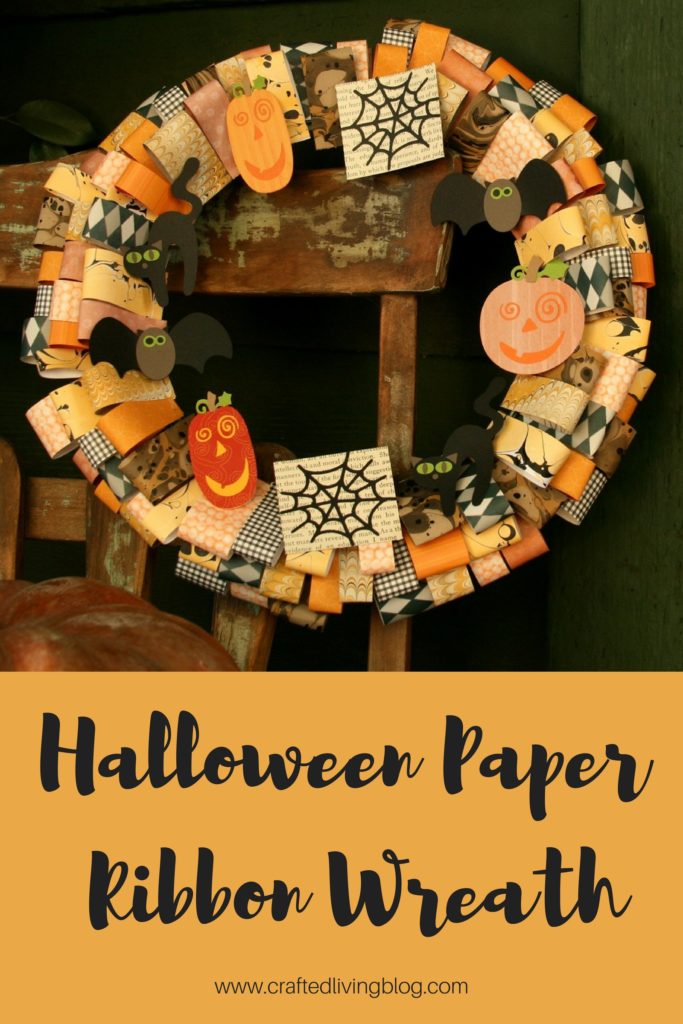 Make this easy DIY Halloween wreath to add spooky style to your front door or porch. By following the simple step-by-step tutorial, you'll have a cute wreath in a few hours! #craftedliving #halloween #halloweencrafts #wreaths #diycrafts