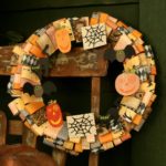 Make this easy DIY Halloween wreath to add spooky style to your front door or porch. By following the simple step-by-step tutorial, you'll have a cute wreath in a few hours! #craftedliving #halloween #halloweencrafts #wreaths #diycrafts