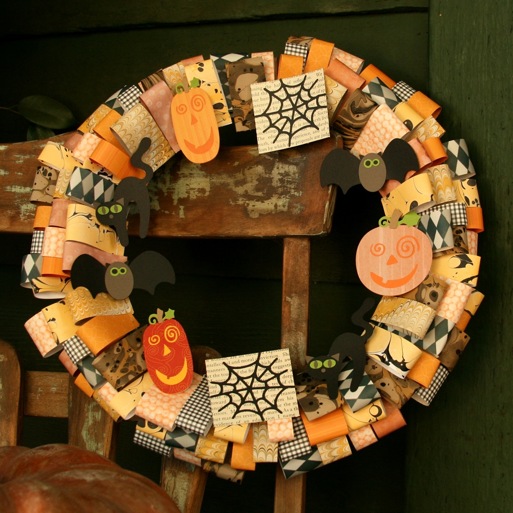 Make this easy DIY Halloween wreath to add spooky style to your front door or porch. By following the simple step-by-step tutorial, you'll have a cute wreath in a few hours! #craftedliving #halloween #halloweencrafts #wreaths #diycrafts