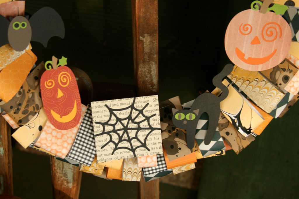 Halloween Paper Ribbon Wreath #paperwreath #wreath #diytutorial #halloween #halloweendecor #halloweendiy #craftedliving #diecut #diy #cricut