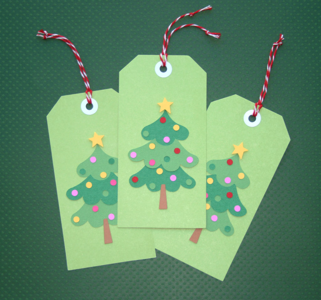 Make these quick and easy diy Christmas Tree Gift Tags using your Cricut. By following the simple step-by-step tutorial, you'll have handmade gift tags to make your Christmas gifts extra special. #craftedliving #christmas #christmasgifts #christmascrafts