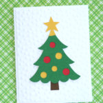 Make this easy DIY Christmas card using your Cricut. By following the simple step-by-step tutorial, you'll have a beautiful handmade card to give at Christmas. #craftedliving #christmascards #christmascrafts #diychristmas #christmas