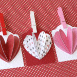 Celebrate love by making these easy DIY heart tags using your favorite paper. Fun idea to add to your Valentine's Day or Galentine's Day treats to make them extra special. #craftedliving #valentinesday #galentine #diycrafts