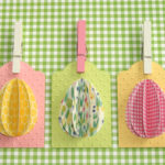 Celebrate Easter by making these simple DIY egg tags using your favorite paper. Fun idea to add to your Easter baskets or treats to make them extra special. #craftedliving #easter #easterdiy #diycrafts